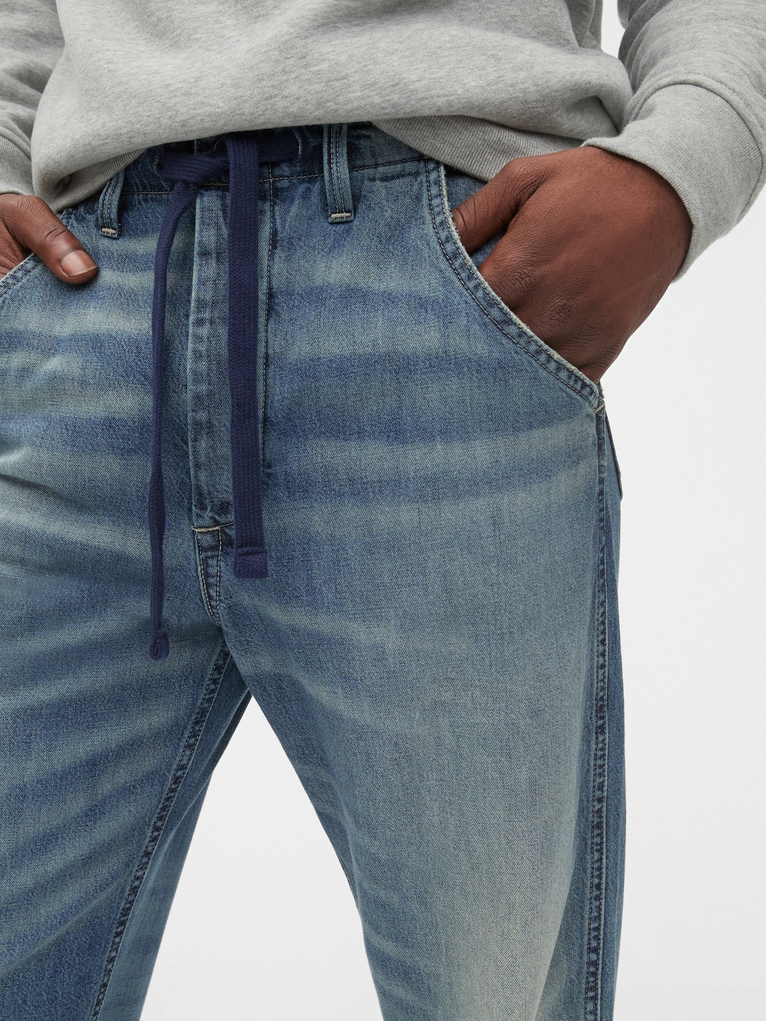 Faded wash best sale drawstring waist jeans