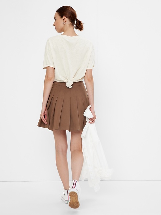 Widow Pleated Mini Skirt With Attached Legs