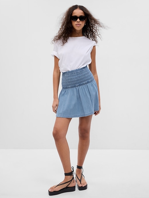 Image number 1 showing, LENZING&#153 TENCEL&#153 Lyocell Smocked Denim Mini Skirt with Washwell