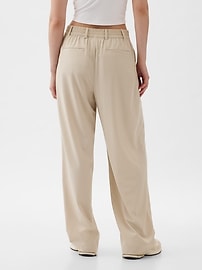 View large product image 15 of 18. GapFit High Rise Runaround Trousers