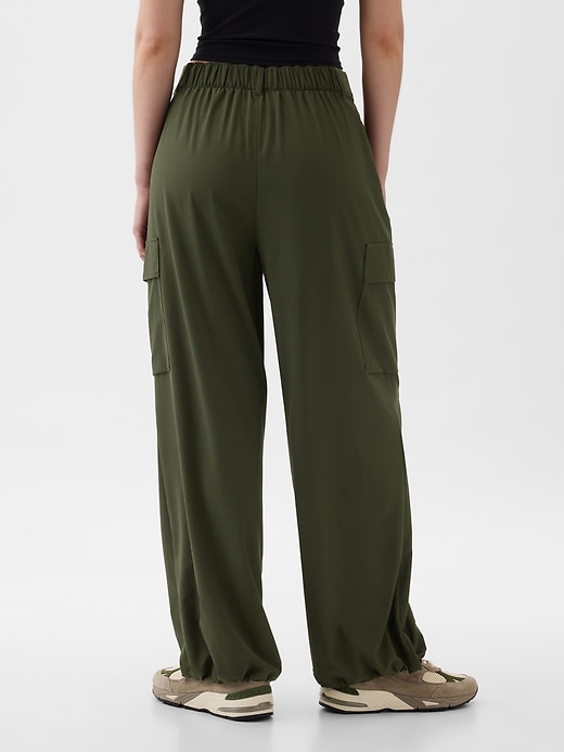 View large product image 2 of 18. GapFit High Rise Runaround Cargo Joggers