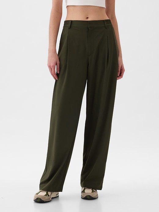 View large product image 1 of 18. GapFit High Rise Runaround Trousers