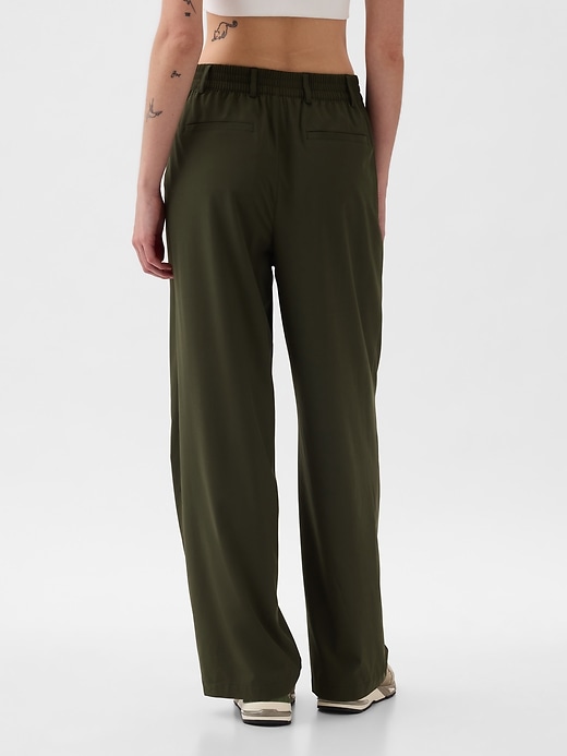 View large product image 2 of 18. GapFit High Rise Runaround Trousers