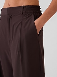 View large product image 14 of 18. GapFit High Rise Runaround Trousers