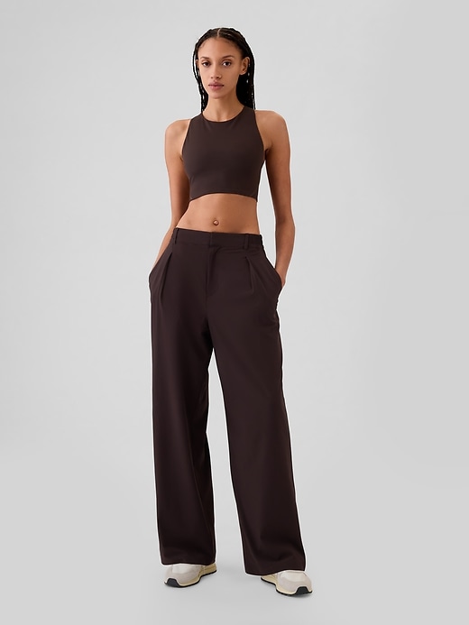 View large product image 1 of 18. GapFit High Rise Runaround Trousers