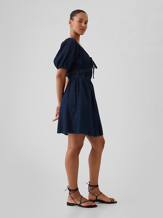 Image number 3 showing, Smocked Denim Mini Dress