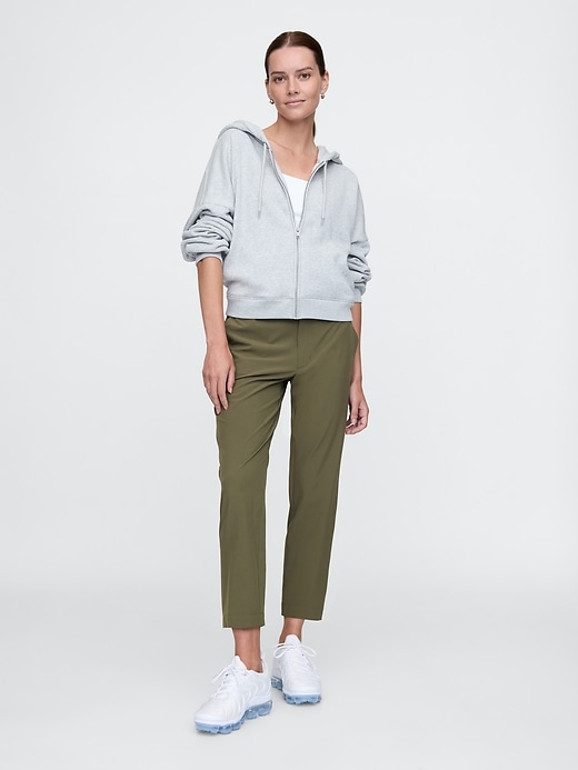 View large product image 1 of 15. GapFit High Rise Downtown Runaround Pants